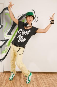 Cool hip-hop dancer wearing tshirt with "c'est la vie" on it
