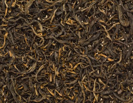Background filled with dry chineese tea leafs