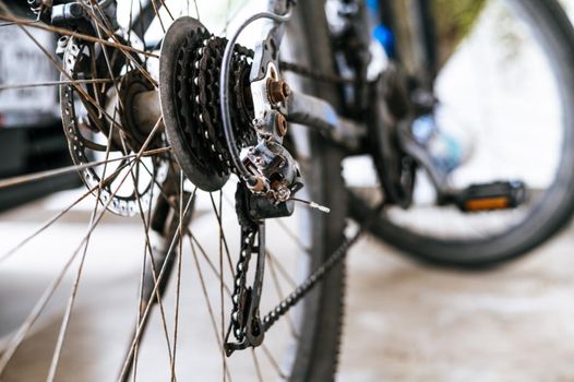 Parts of a bicycle, view of pinion and drive system, rear disc brake