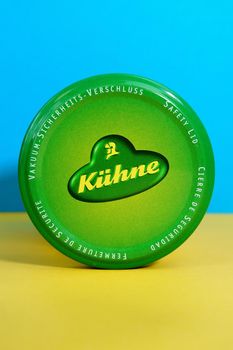Tyumen, Russia-april 17, 2021: Kuhne logo on the lid. Mustard, horseradish, sauces, vinegars canned vegetables and snacks