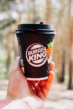 Tyumen, Russia-May 25, 2021: Burger Kings coffee cup. American Fast Food Restaurant. Logo