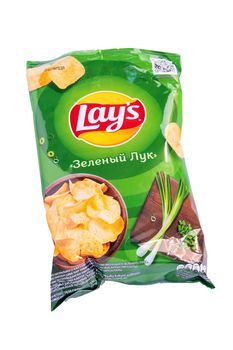 Tyumen, Russia-May 25, 2021: lays chips with sour cream and onion. Lays is the world largest distributed eatery.