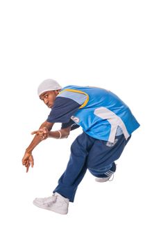 Hip-hop young man making cool move isolated on white background