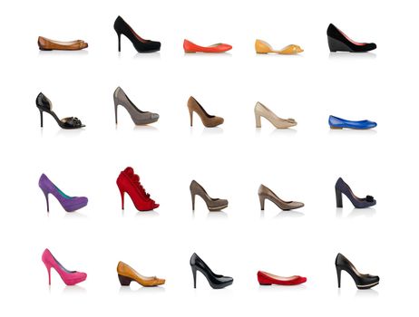 Many fashionable female shoes shot in profile on white background with reflection