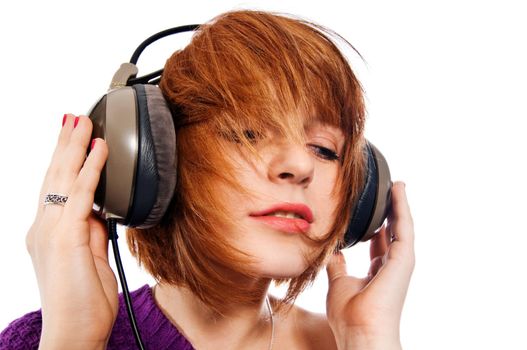 beautiful girl with headphones isolated on white