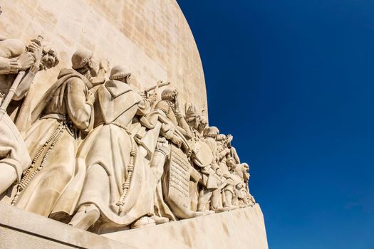 Colossal Discovery Monument on a sunny day next to Tagus River at sunset in Lisbon