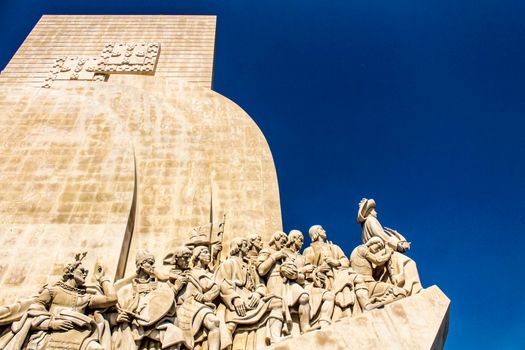 Colossal Discovery Monument in a sunny day next to Tagus River at sunset in Lisbon