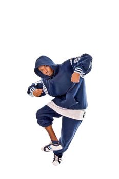 Cool young hip-hop dancer on white background