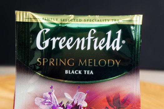 Tyumen, Russia-May 25, 2021: Greenfield Spring Melody tea bags. Manufactured by Orimi Trade and Greenfield Tea ltd.