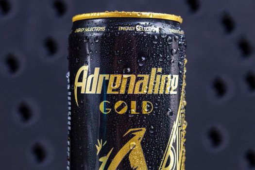 Tyumen, Russia-May 25, 2021: Adrenaline Rush Energy drink, metal can. Close up. Black background