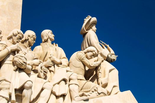 Colossal Discovery Monument in a sunny day next to Tagus River at sunset in Lisbon