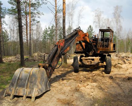 Heavy excavator at the sand pit