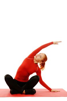 Beautiful slim red fit woman over white background