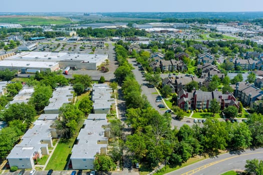Aerial view of the residential area of beautiful suburb of home dwelling and road from a height in US