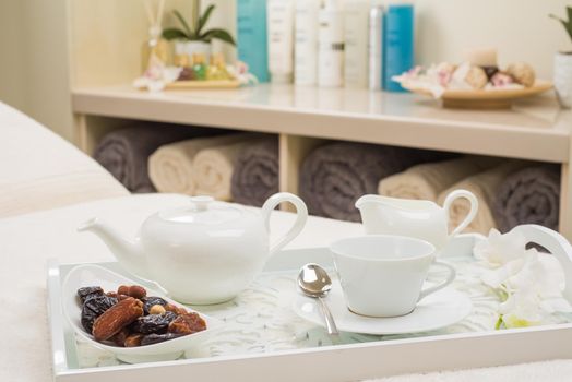 English tea set with dried fruit dessert in SPA salon