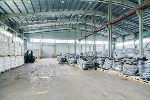 Interior of new large and modern warehouse space with nobody around