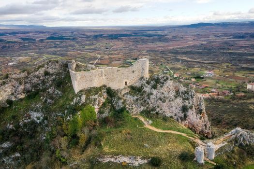 Aerial view of Poza de la Sal castle and village in Burgos, Castile and Leon, Spain . High quality 4k footage