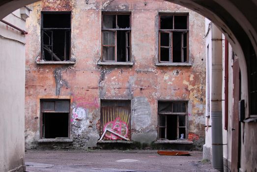 Abandoned building in the modern city
