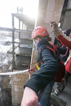 ZHELEZNODOROZHNIY, RUSSIA - March 2, 2008 - Rope jumping event held at the abandoned building construction site. Sports enthusiast groups organize such events for adrenaline lovers from all over Moscow district