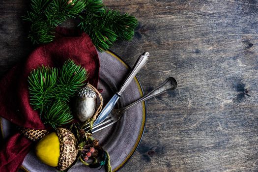Festive table setting for Christmas holiday dinner
