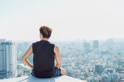 Man Sitting Rest Rooftop Concept