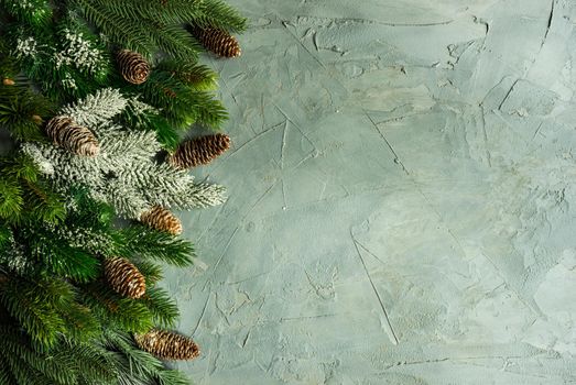 Minimalistic Christmas card concept on concrete background with copy space