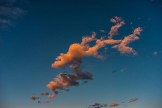 Sunset sky with clouds as a natural background