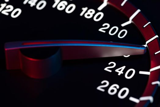 Speed detail with car odometer or tachometer macro shot