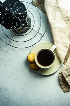 Morning cup of coffee and milk cookies served on the table