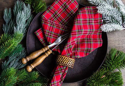 Festive table setting for Christmas holiday dinner