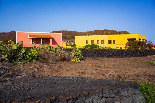 Characteristic view of Linosa with the typical colorful houses and the pricly pears in the garden