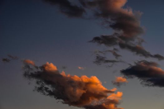 Sunset sky with clouds as a natural background
