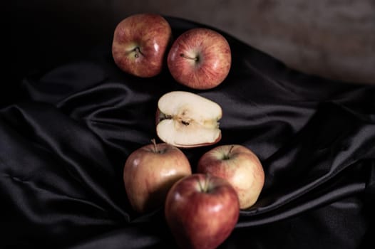 composition of red apples with rustic background