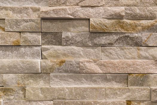 masonry wall paving stones as a background close up. High quality photo