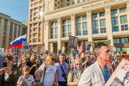 Moscow, Russia - May 9: Immortal Regiment marches on. Moscow celebrates 71-th Victory Day anniversary on May 9, 2016 in Moscow.