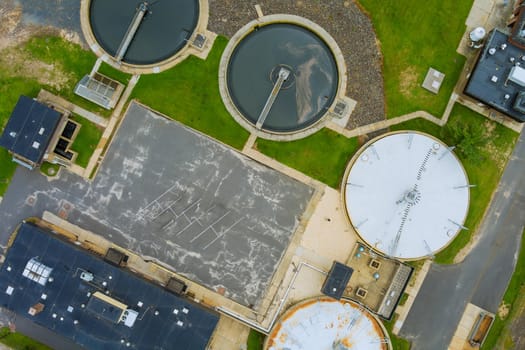 Industrial water treatment of primary sedimentation stage, sewage flowing through large circular tanks