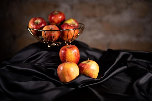 composition of red apples with rustic background