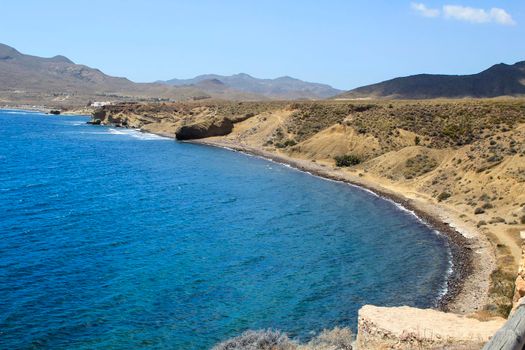 Cala Violeta beach in Isleta del Moro village in Cabo de Gata, Almeria, Spain