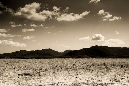 Beautiful view of Salinas beach in Cabo de Gata with mountains in the background