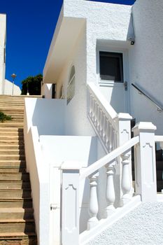 White house and stairs in Isleta del Moro village, Cabo de Gata, Almeria, Spain