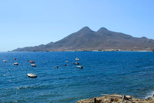 Beautiful seascape in Isleta del Moro village. Volcanous in the background.