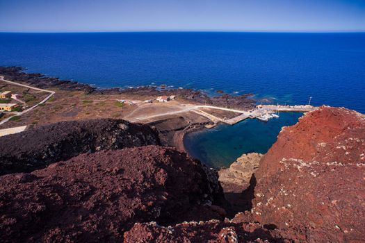 Top view of the beach called Cala Pozzolana di Ponente from the top of the Volcano Monte Nero, Linosa, Sicily