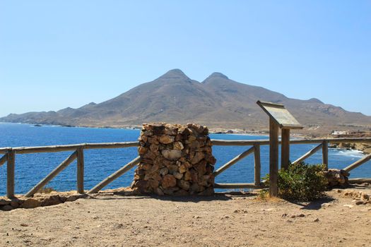Beautiful seascape in Isleta del Moro village. Volcanous in the background.