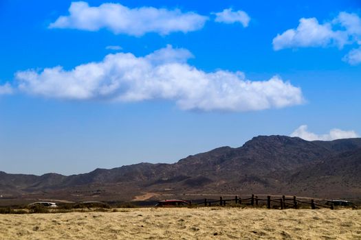 Beautiful view of Salinas beach in Cabo de Gata with mountains in the background