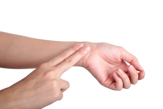 Female hand checking pulse on white background.