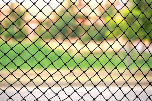 Fishing net on public park background.