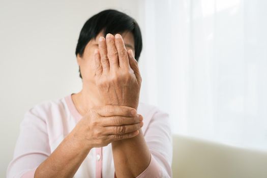 wrist hand pain of old woman, healthcare problem of senior concept