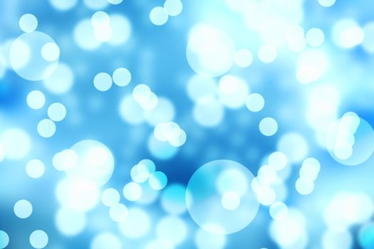 Abstract Bokeh blue light background texture.