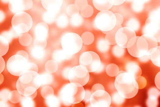 Abstract Bokeh orange light background texture.