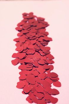 Valentine's day decorative background with hearts tinsel.